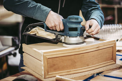 Man working on wood