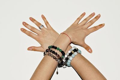 Close-up of human hand against white background