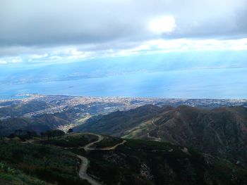 Aerial view of landscape and mountains against sky