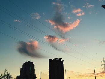 Low angle view of vapor trails in sky