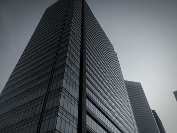 Low angle view of modern building against clear sky