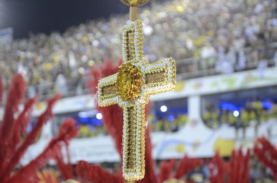 Close-up of cross hanging against temple