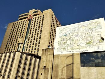 Low angle view of modern building against clear sky
