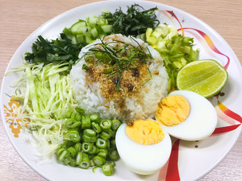 High angle view of salad in plate on table