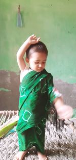 Cute boy standing outdoors