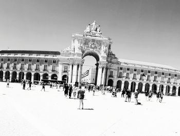 Group of people in front of historical building