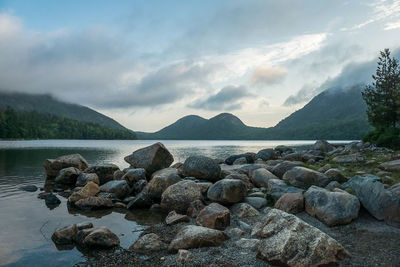 Scenic view of river and mountains