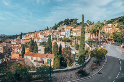 High angle view of street amidst buildings in town