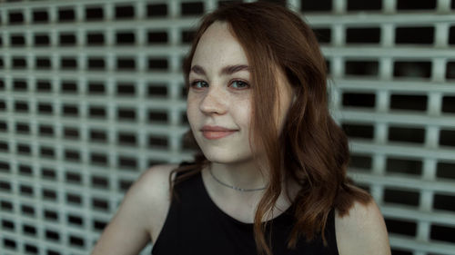 Close-up of young woman looking away