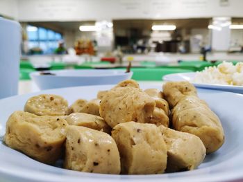 Close-up of bread in plate on table
