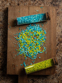 High angle view of multi colored candies on table