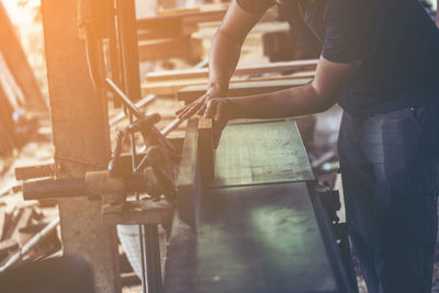 Man working on wood