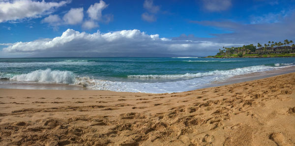 Scenic view of beach against sky