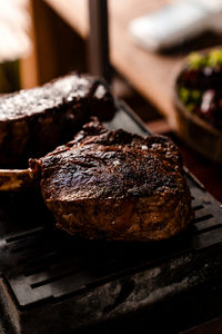 Close-up of meat on cutting board