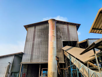 Low angle view of old building against sky