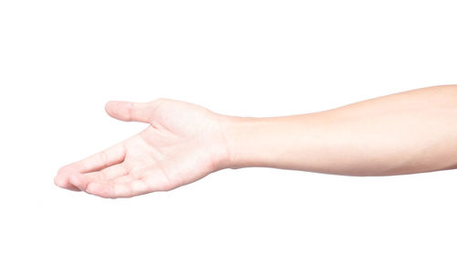 Close-up of hand over white background