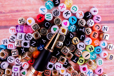 Directly above shot of pen and letters on table