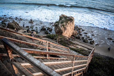 High angle view of steps leading towards beach