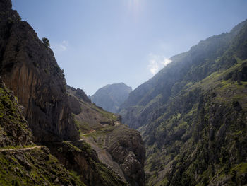 Scenic view of rocky mountains against sky