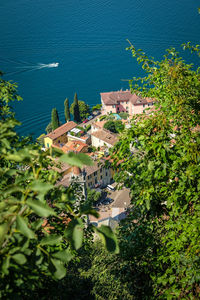 High angle view of townscape by sea