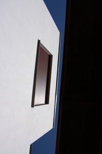 Low angle view of modern building against clear sky