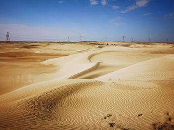 Scenic view of desert against sky