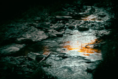 High angle view of rocks in water