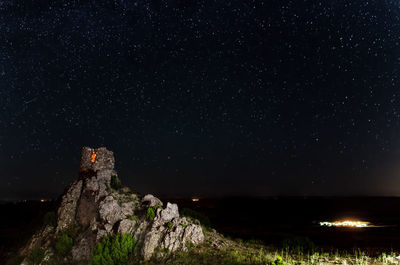 Scenic view of star field against sky at night