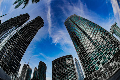 Low angle view of skyscrapers against sky