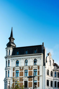 Low angle view of church against sky in town