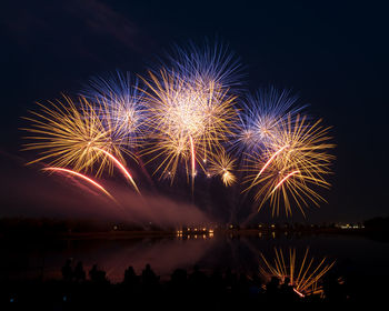 Firework display at night