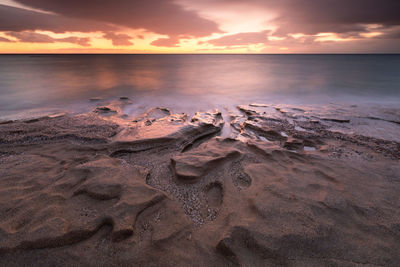 Sandstone rock formations on a beach near goudouras village, crete.