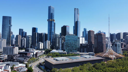 Modern buildings in melbourne city against clear sky