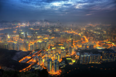 High angle view of illuminated cityscape at night