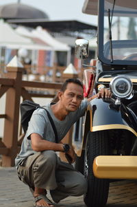 Side view of man exercising in gym