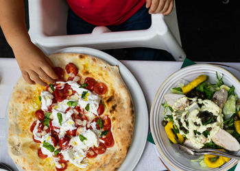 High angle view of pizza on table