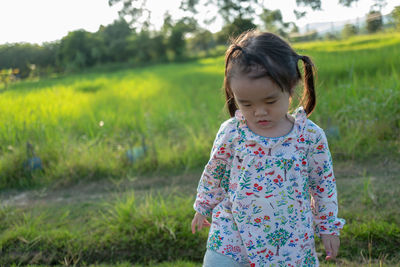 Cute girl on field