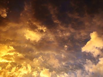 Low angle view of clouds in sky during sunset