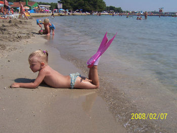 Rear view of woman on beach