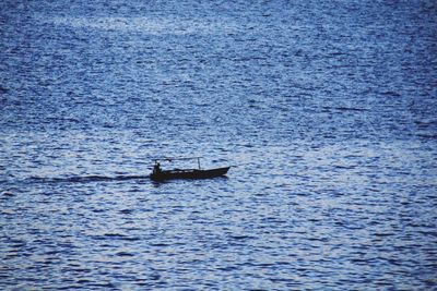 Boat sailing in sea