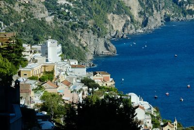 High angle view of town by sea