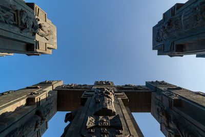 Low angle view of buildings against clear sky