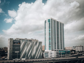 Low angle view of modern buildings against sky