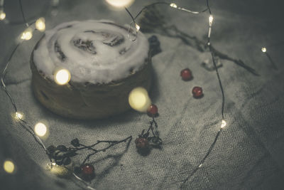 Close-up of illuminated christmas lights on table