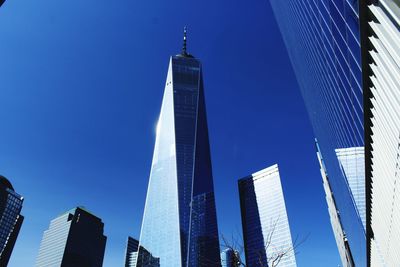 Low angle view of modern buildings against clear sky