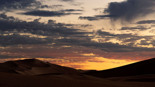 Scenic view of dramatic sky during sunset