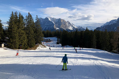 Man skiing on snow covered mountain