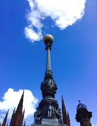 Low angle view of building against blue sky