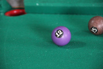 Close-up of pool balls on table