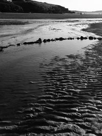 Scenic view of sea shore against sky